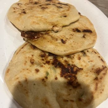 Las Maria’s Restaurant - 2 revuelta pupusas and one Lorroco. - Salvadoran Near Me - Plano, Texas