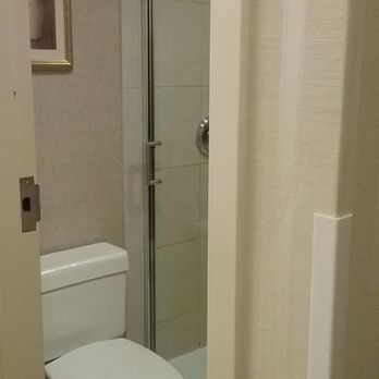 Hilton Chicago/Northbrook - "Compact" toilet/shower room - Hotels Near Me - Northbrook, Illinois