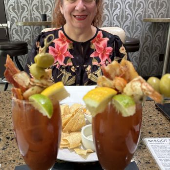 Bardot - Queen Mary bloody marys ($18/ea.) Loaded with 2 strips of bacon, 2 grilled shrimp, and 2 giant olives. - New American Near Me - Claremont, California Bardot - Queen Mary bloody marys ($18/ea.) Loaded with 2 strips of bacon, 2 grilled shrimp, and 2 giant olives. - New American Near Me - Claremont, California