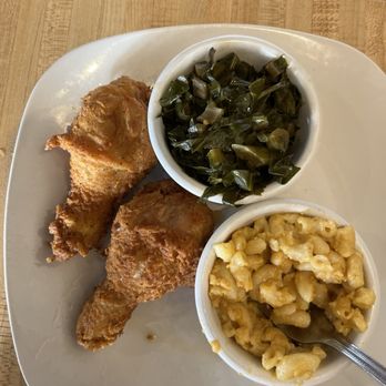 Kinfolks Southern Kitchen - 2 piece fried chicken my son requested 2 legs instead of a leg and thigh, with greens and mac and cheese. - Southern Near Me - Stuart, Florida
