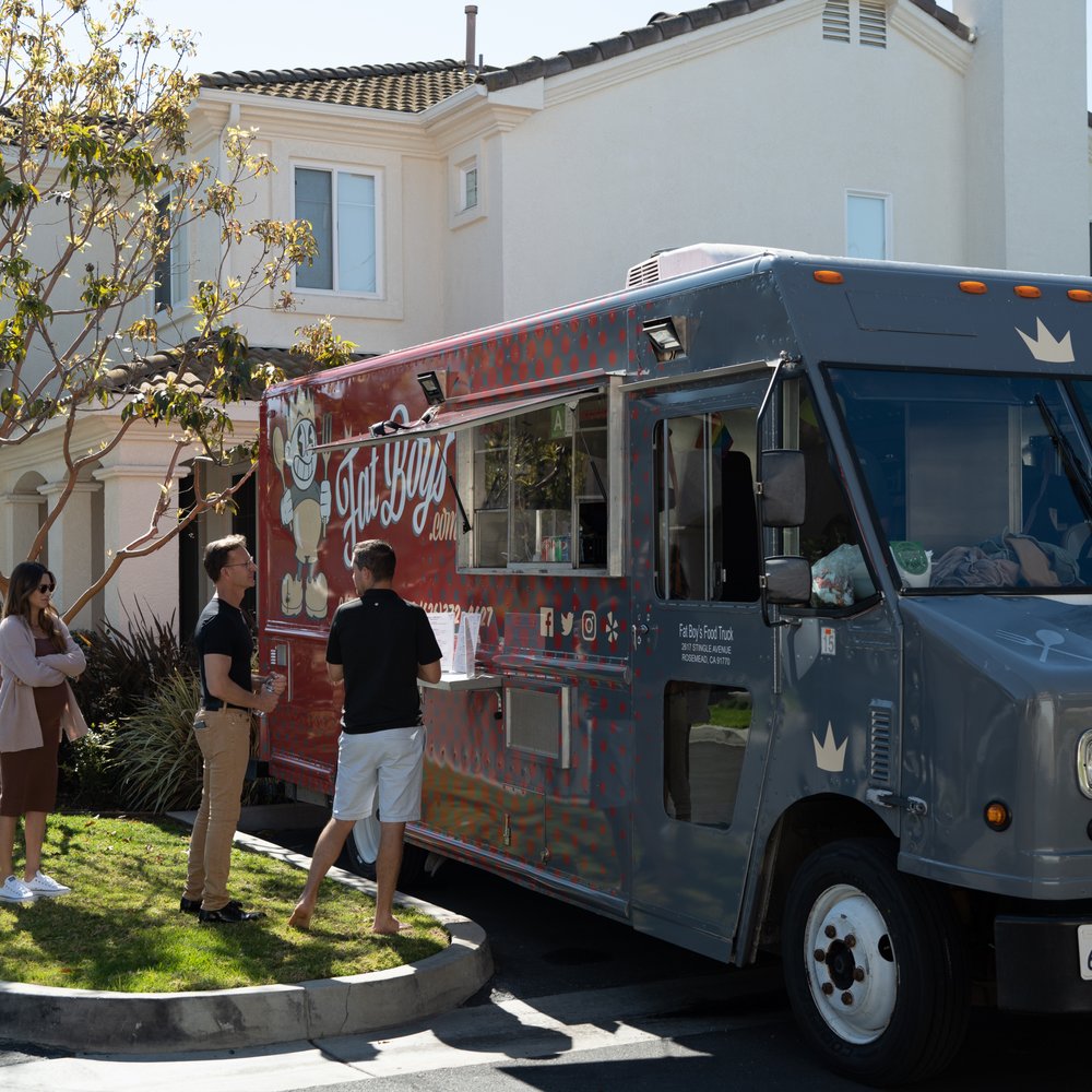 Fat Boys - a food truck parked in front of a house - Food Trucks Near Me Fat Boys - a food truck parked in front of a house - Food Trucks Near Me