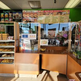 the interior of a donut shop the interior of a donut shop