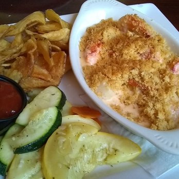 Supino's Restaurant - Seafood casserole with saute vegetables and locally made sweet potato chips. - Pizza Near Me - Danvers, Massachusetts Supino's Restaurant - Seafood casserole with saute vegetables and locally made sweet potato chips. - Pizza Near Me - Danvers, Massachusetts