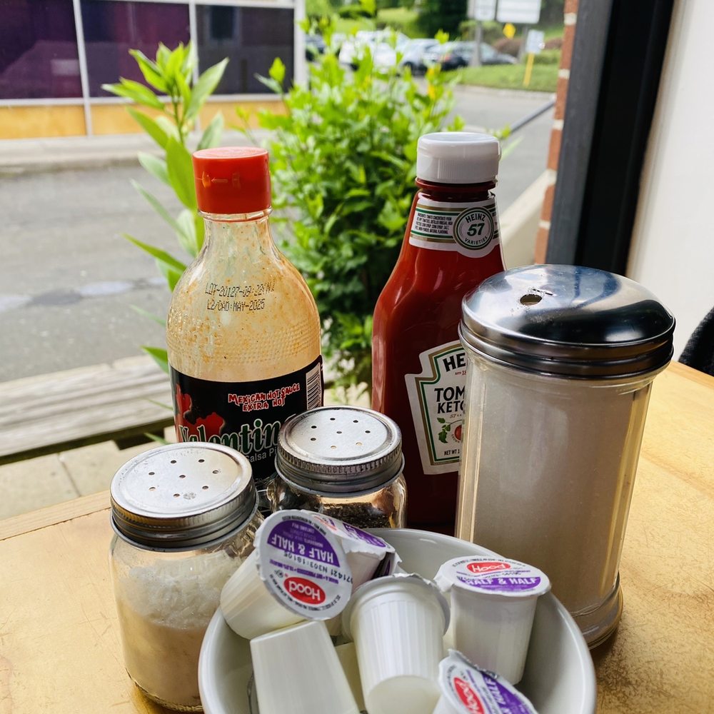 Trumbull Cafe & Grill - a table with condiments and condiments - Cafes Near Me - Trumbull, Connecticut Trumbull Cafe & Grill - a table with condiments and condiments - Cafes Near Me - Trumbull, Connecticut