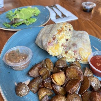 Olive Seed Cafe - Breakfast Burrito with a side of avocado - Breakfast & Brunch Near Me - Yorba Linda, California Olive Seed Cafe - Breakfast Burrito with a side of avocado - Breakfast & Brunch Near Me - Yorba Linda, California