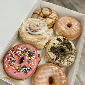 Beyond Amazing Donuts - Box of 6 donuts ($6 via the Goodie Bag app). My fave was the cinnamon roll! - Donuts Near Me - Charlotte, North Carolina Beyond Amazing Donuts - Box of 6 donuts ($6 via the Goodie Bag app). My fave was the cinnamon roll! - Donuts Near Me - Charlotte, North Carolina