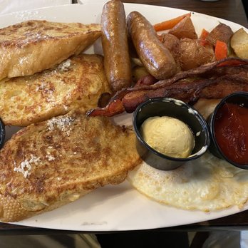 Toasted - French toast, sausage,bacon, home style potatoes and eggs - Breakfast & Brunch Near Me - Bakersfield, California Toasted - French toast, sausage,bacon, home style potatoes and eggs - Breakfast & Brunch Near Me - Bakersfield, California