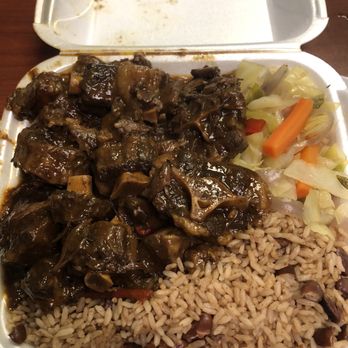 Island Grill & Pub - Large oxtail dinner. Rice and Peas & Cabbage - Caribbean Near Me - Rock Hill, South Carolina Island Grill & Pub - Large oxtail dinner. Rice and Peas & Cabbage - Caribbean Near Me - Rock Hill, South Carolina