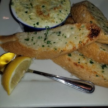 Pappadeaux Seafood Kitchen - Spinach and crab dip with garlicky cheese toast. Had to get a reheat. After that it was DELICIOUS!!!! - Cajun/Creole Near Me - Norcross, Georgia