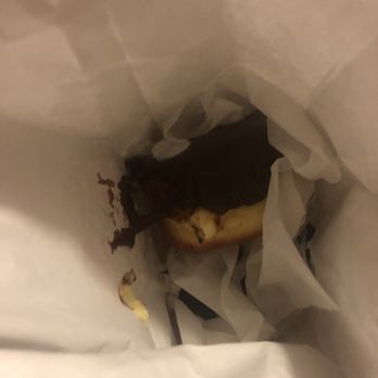 Voodoo Doughnut - My donuts crammed into the bag - Bakeries Near Me - Orlando, Florida