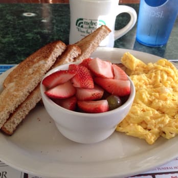 Metro Diner - Scrambled eggs (cooked well) side of fruit and toast - Breakfast & Brunch Near Me - Jacksonville, Florida Metro Diner - Scrambled eggs (cooked well) side of fruit and toast - Breakfast & Brunch Near Me - Jacksonville, Florida