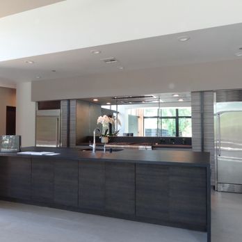 HighCo Builders - a kitchen with a large island - General Contractors Near Me HighCo Builders - a kitchen with a large island - General Contractors Near Me