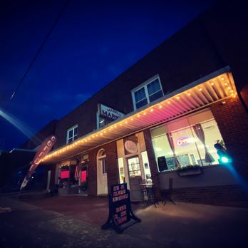Simply Coffee - the outside of a cafe at night - Coffee & Tea Near Me - Robbins, North Carolina