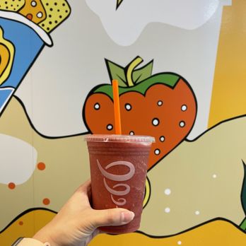 Jamba - a hand holding a cup of fruit smoothie - Juice Bars & Smoothies Near Me - Wylie, Texas Jamba - a hand holding a cup of fruit smoothie - Juice Bars & Smoothies Near Me - Wylie, Texas