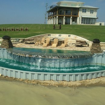 J.E.P. Marine and Consruction - a pool with a waterfall in it - General Contractors Near Me - Rockwall, Texas J.E.P. Marine and Consruction - a pool with a waterfall in it - General Contractors Near Me - Rockwall, Texas