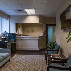 South Shore Smiles - Our reception area, feel free to watch TV, sip on coffee, or read a magazine.