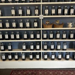 Crumpets Tea Shop - This is the Black tea wall. There is also a green tea , herbal, rooibos wall.