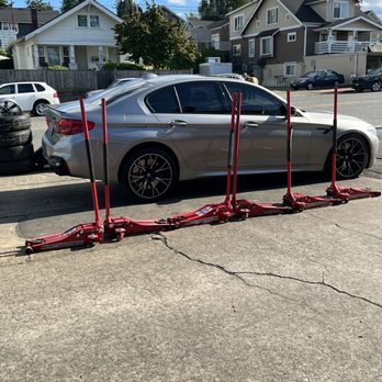 Jeff's Used Tires - My car jacked up in the driveway of Jeff's Used Tire. - Tires Near Me - Tacoma, Washington Jeff's Used Tires - My car jacked up in the driveway of Jeff's Used Tire. - Tires Near Me - Tacoma, Washington