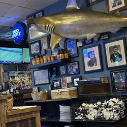 Syberg's O'Fallon - Decor behind hostess station. Obsessed with the hammerhead shark!!