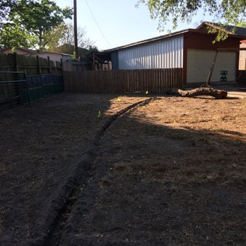 ProTech Landscaping - a back yard with a fence and a shed - Landscaping Near Me ProTech Landscaping - a back yard with a fence and a shed - Landscaping Near Me