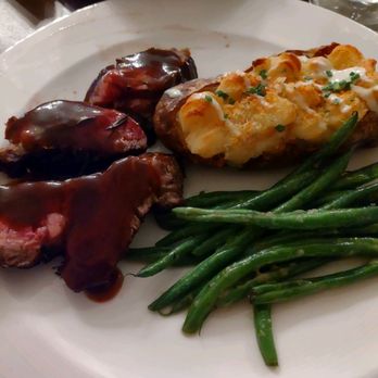 Bentley's Restaurant - Ribeye with gravy, twice baked potato and green beans. Green beans cooked perfectly ! - French Near Me - Charlotte, North Carolina Bentley's Restaurant - Ribeye with gravy, twice baked potato and green beans. Green beans cooked perfectly ! - French Near Me - Charlotte, North Carolina