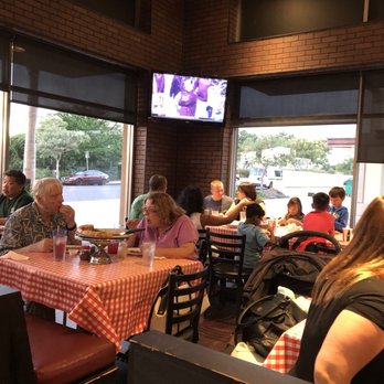 Brick Oven Pizza - A college football game on one TV - Pizza Near Me - Kapolei, Hawaii