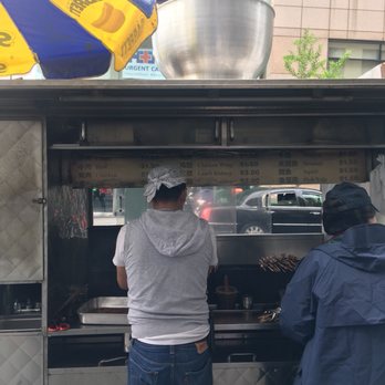 Xinjiang BBQ Cart - Grill master at work. - Barbeque Near Me - Flushing, New York