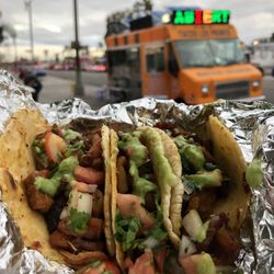 3 pastor tacos with some added toppings