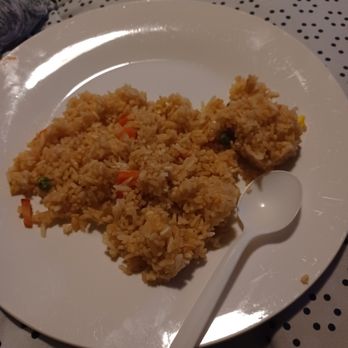 Golden Dragon - a plate of rice with a spoon - Chinese Near Me - Ellensburg, Washington