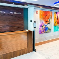 M&M Private Lending Group - An inviting image capturing the front desk area of M&M Private Lending Group, branded decor, and a well-lit, professional atm...