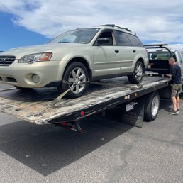 Business Owner Dean securing my prized 2006 Subie.