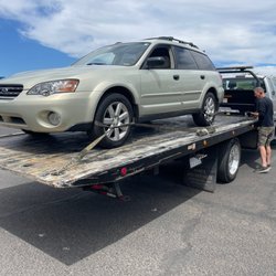 Ace Flatbed Towing - Business Owner Dean securing my prized 2006 Subie.