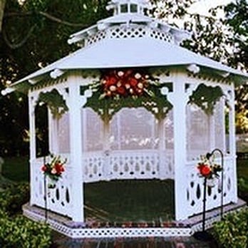 Victoria's Garden - The gazebo flowers doubled its use as the sweetheart table decor during the reception. - Floral Designers Near Me Victoria's Garden - The gazebo flowers doubled its use as the sweetheart table decor during the reception. - Floral Designers Near Me