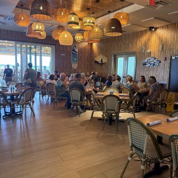 The Natives at Lake Okahumpka - Main dining room inside - American Near Me - The Villages, Florida The Natives at Lake Okahumpka - Main dining room inside - American Near Me - The Villages, Florida