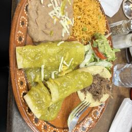 2 Combo 2 with green sauce, one with cheese sauce (tasted like it was made from scratch not canned!), one enchilada plate with green sauce. 2 Combo 2 with green sauce, one with cheese sauce (tasted like it was made from scratch not canned!), one enchilada plate with green sauce.