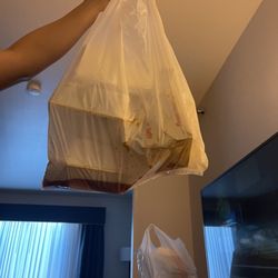 Thai Kitchen - My order got delivered with liquid piled up at the bottom of my bag. It was messy and terrible to take out the food.
