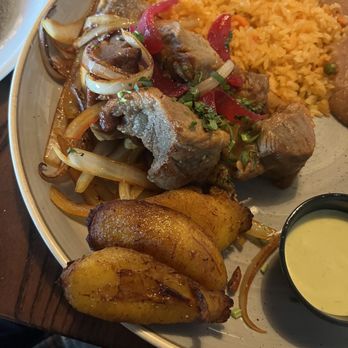Tres amigos - Close up of the plantain and pork - Mexican Near Me - Louisville, Kentucky Tres amigos - Close up of the plantain and pork - Mexican Near Me - Louisville, Kentucky
