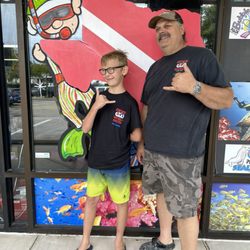 Dive World Austin - My son with Divemaster Carl