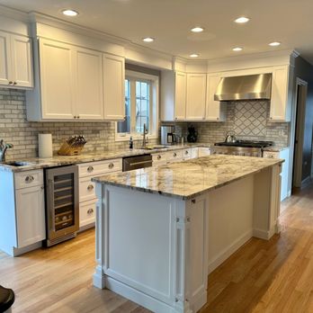 Ideal Home Improvement - Refaced cabinets and addition of a matching island - Cabinetry Near Me - Dracut, Massachusetts Ideal Home Improvement - Refaced cabinets and addition of a matching island - Cabinetry Near Me - Dracut, Massachusetts