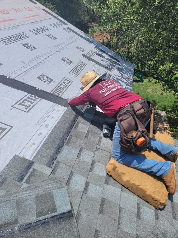 Slide of Tux Roofing