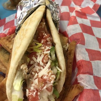 Mim's Mediterranean Grill - Chicken Caesar Gyro w/ Pita Chips Crispy Chicken Gyro w/ Fiery Feta Fries - Greek Near Me - Petoskey, Michigan