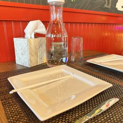 DESI STREET - Each place setting comes with what you need and the very thoughtful edition of tissues!