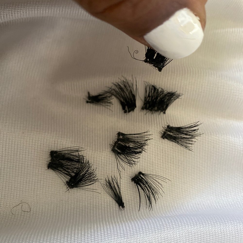Nails on LA - On for less than 24 hours because they were uncomfortable and pulling my lashes. Notice how badly the lashes are clumped up smh - Nail Salons Near Me - Compton, California