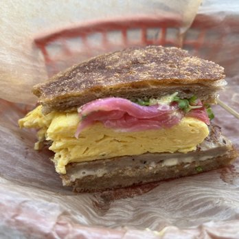 Songbird - Half a Sprouted English muffin sammie (with a bite taken out)! - Breakfast & Brunch Near Me - St. Louis, Missouri Songbird - Half a Sprouted English muffin sammie (with a bite taken out)! - Breakfast & Brunch Near Me - St. Louis, Missouri