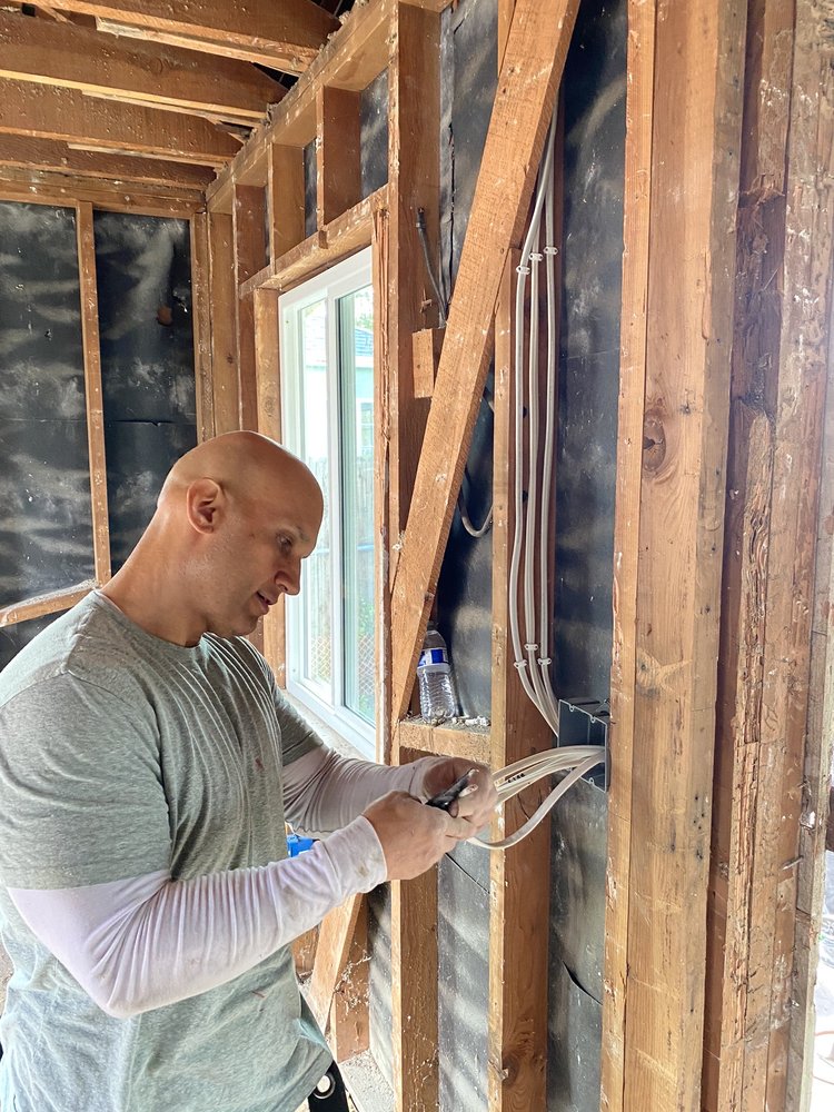 Slide of Master Electric & Garage Doors