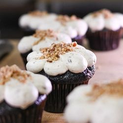 Red Bird Bakery - Chocolate Cupcake with Brown Butter Bourbon Frosting topped with Pecans