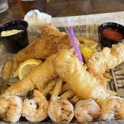 The Highlander Public House - Fish & Chips with side of shrimp. Really good except fish a bit on the greasy side.