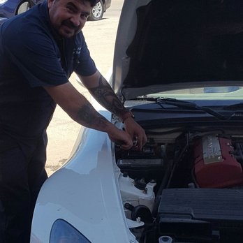 Lovefield Auto Repair - Asked one of the mechanics to pose for a photo op because I knew I would give a good review. He obliged! - Auto Repair Near Me - Dallas, Texas