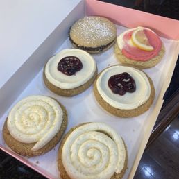 Cannoli cookie, raspberry lemonade cookie, and two others. Cannoli cookie, raspberry lemonade cookie, and two others.