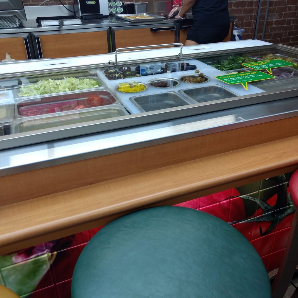Subway - a man standing in front of a food counter - Sandwiches Near Me - Gastonia, North Carolina Subway - a man standing in front of a food counter - Sandwiches Near Me - Gastonia, North Carolina